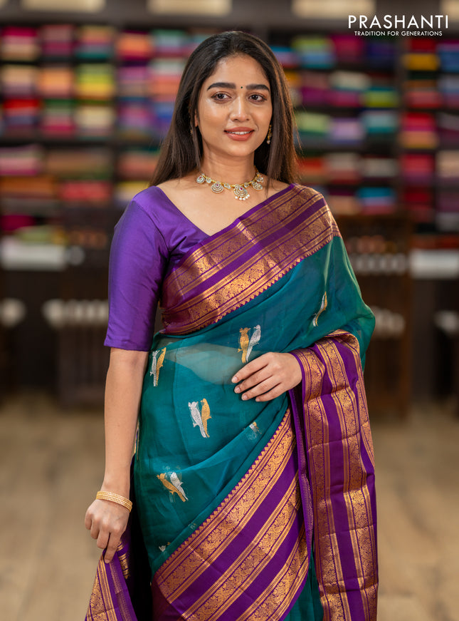 Kanchipuram kora silk saree teal green and purple with silver & gold zari woven buttas and long zari woven border