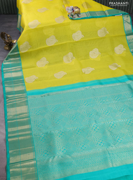 Kanchipuram kora silk saree lime yellow and green with zari woven paisley buttas and zari woven border