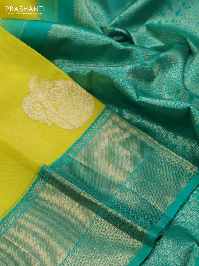 Kanchipuram kora silk saree lime yellow and green with zari woven paisley buttas and zari woven border