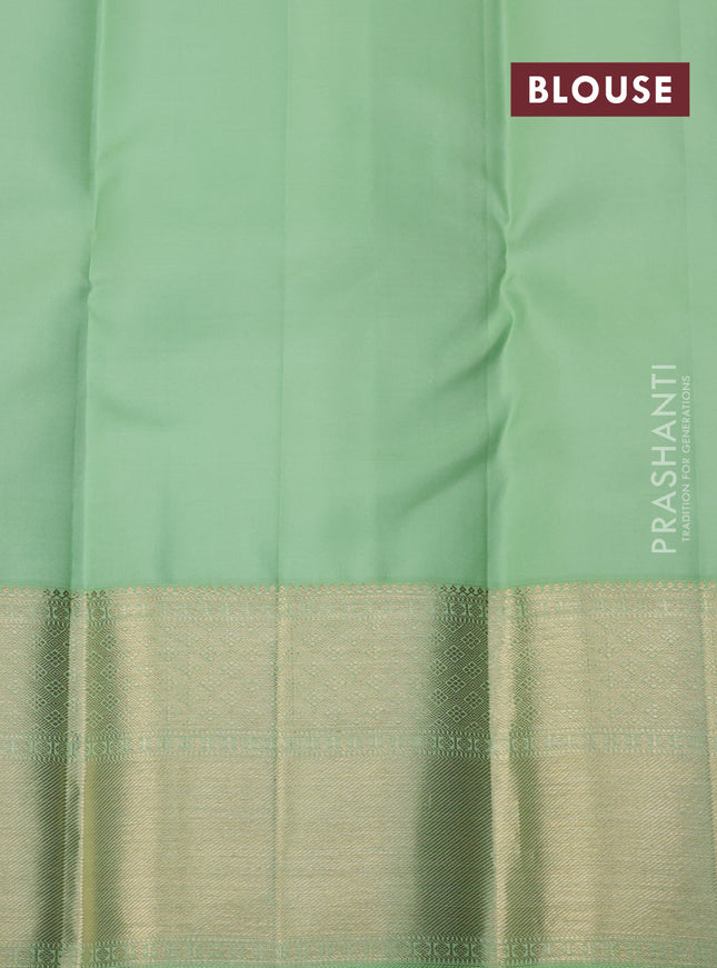 Pure kanchipuram silk saree red and pastel green with allover zari woven brocade weaves and zari woven border