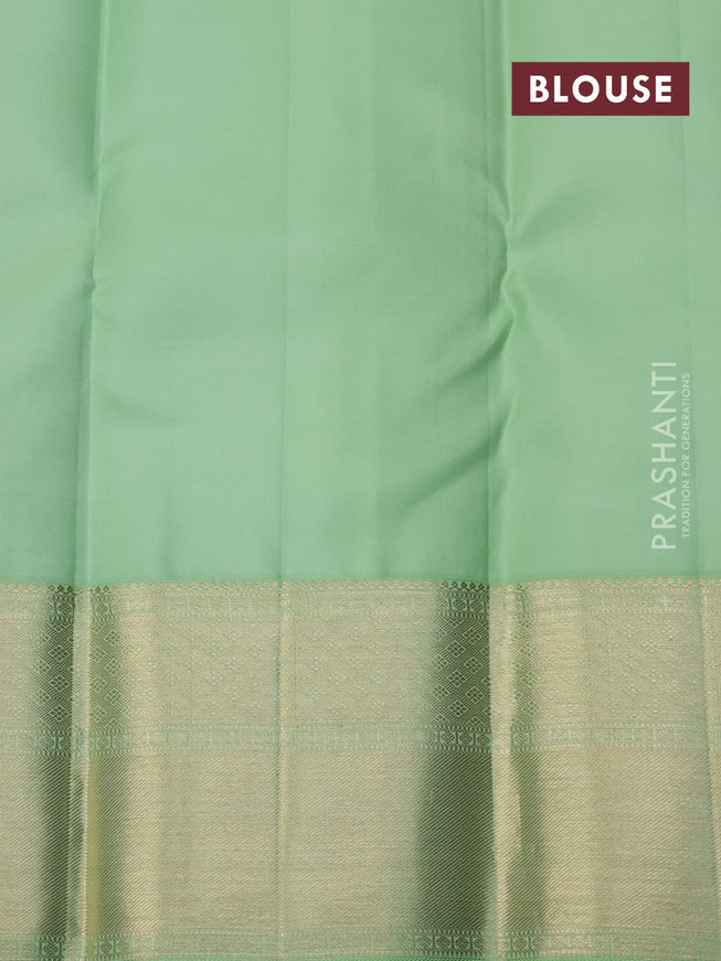 Pure kanchipuram silk saree red and pastel green with allover zari woven brocade weaves and zari woven border