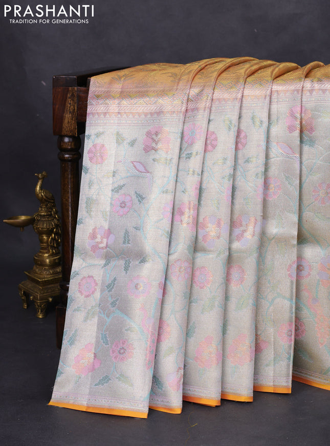 Pure kanchipuram tissue silk saree pastel pink with allover jamdhani weaves and long zari woven floral border