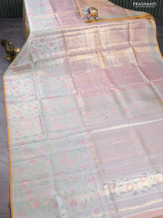 Pure kanchipuram tissue silk saree pastel pink with allover jamdhani weaves and long zari woven floral border