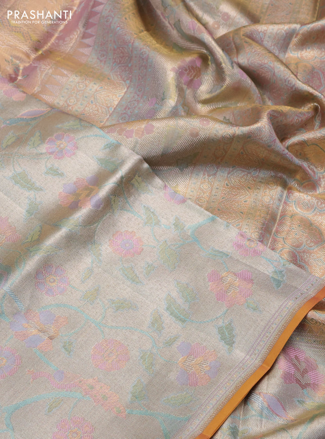 Pure kanchipuram tissue silk saree pastel pink with allover jamdhani weaves and long zari woven floral border