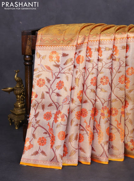 Pure kanchipuram tissue silk saree gold with allover jamdhani weaves and long zari woven floral border