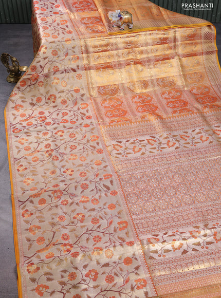 Pure kanchipuram tissue silk saree gold with allover jamdhani weaves and long zari woven floral border