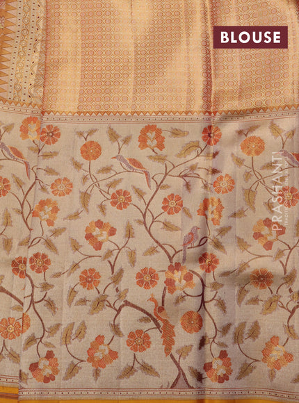 Pure kanchipuram tissue silk saree gold with allover jamdhani weaves and long zari woven floral border