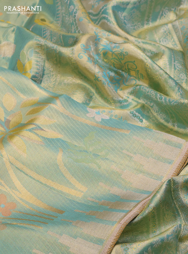 Pure kanchipuram tissue silk saree teal green with allover jamdhani weaves and temple design simple border