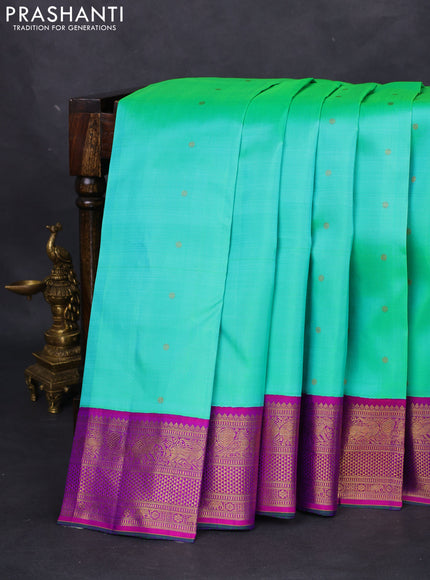 Pure kanchipuram silk saree teal green and purple with zari woven buttas and zari woven korvai border