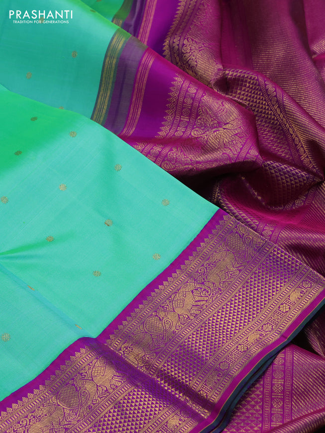 Pure kanchipuram silk saree teal green and purple with zari woven buttas and zari woven korvai border