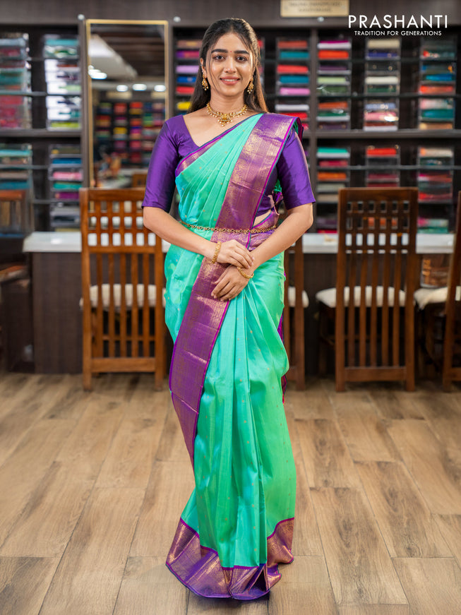Pure kanchipuram silk saree teal green and purple with zari woven buttas and zari woven korvai border