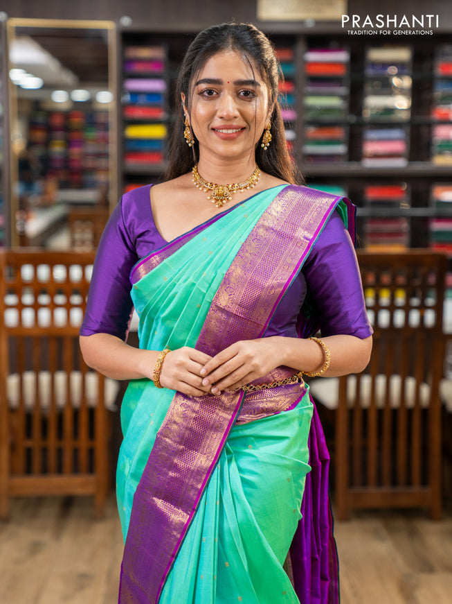 Pure kanchipuram silk saree teal green and purple with zari woven buttas and zari woven korvai border