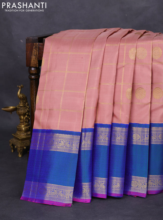 Pure kanchipuram silk saree pastel peach and dual shade of bluish green with allover zari checks & annam chakkaram buttas and rettapet zari woven border