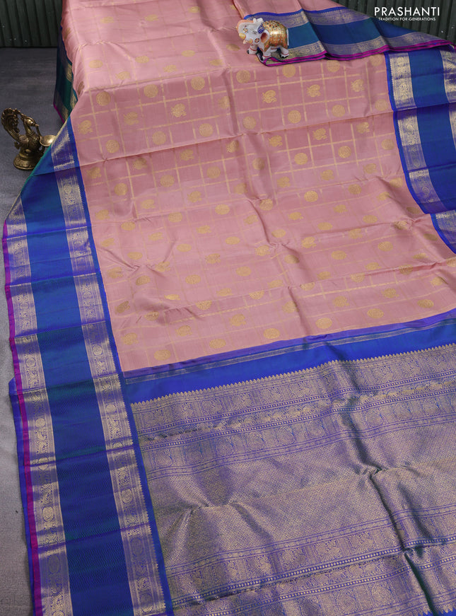 Pure kanchipuram silk saree pastel peach and dual shade of bluish green with allover zari checks & annam chakkaram buttas and rettapet zari woven border