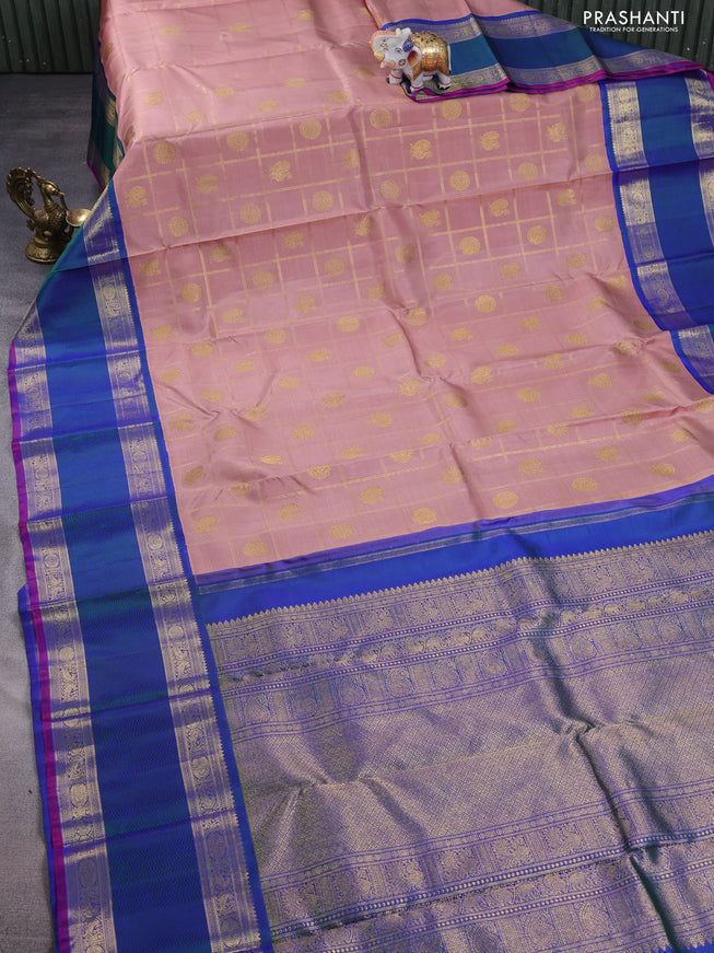 Pure kanchipuram silk saree pastel peach and dual shade of bluish green with allover zari checks & annam chakkaram buttas and rettapet zari woven border