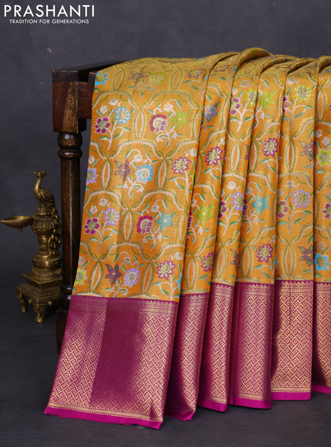 Pure kanchipuram tissue silk saree gold and purple with allover zari woven floral design mina weaves and zari woven border