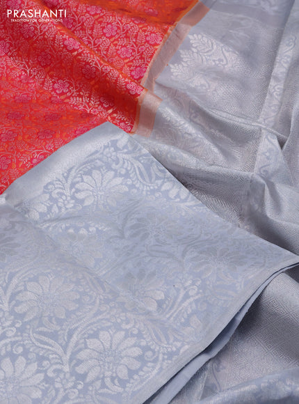 Pure kanchipuram silk saree dual shade of pinkish orange and pastel grey with allover silver zari brocade weaves and long rich silver woven border