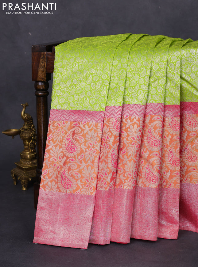 Pure kanchipuram silk saree light green and pink with allover silver zari brocade weaves and long rich zari woven border
