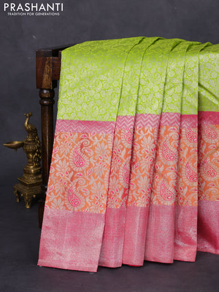 Pure kanchipuram silk saree light green and pink with allover silver zari brocade weaves and long rich zari woven border