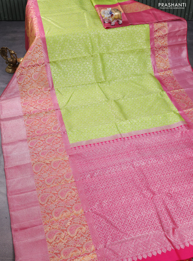 Pure kanchipuram silk saree light green and pink with allover silver zari brocade weaves and long rich zari woven border