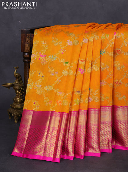 Kanchipuram kora silk saree orange and pink with allover floral zari weaves and zari woven border