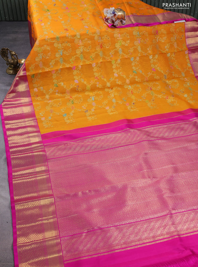 Kanchipuram kora silk saree orange and pink with allover floral zari weaves and zari woven border