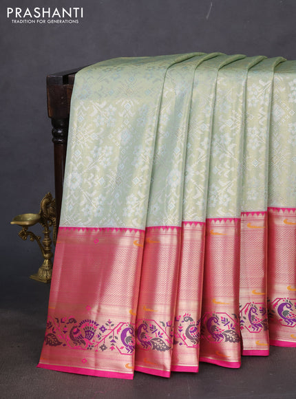 Tissue paithani silk saree pastel green and pink with allover silver zari woven brocade weaves and long zari woven paithani style border
