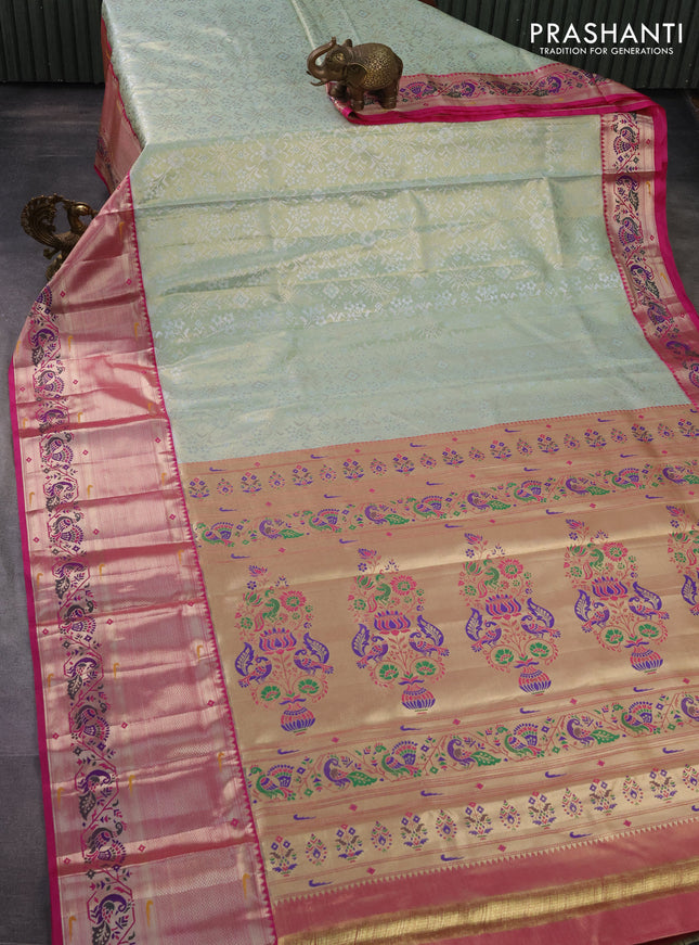 Tissue paithani silk saree pastel green and pink with allover silver zari woven brocade weaves and long zari woven paithani style border