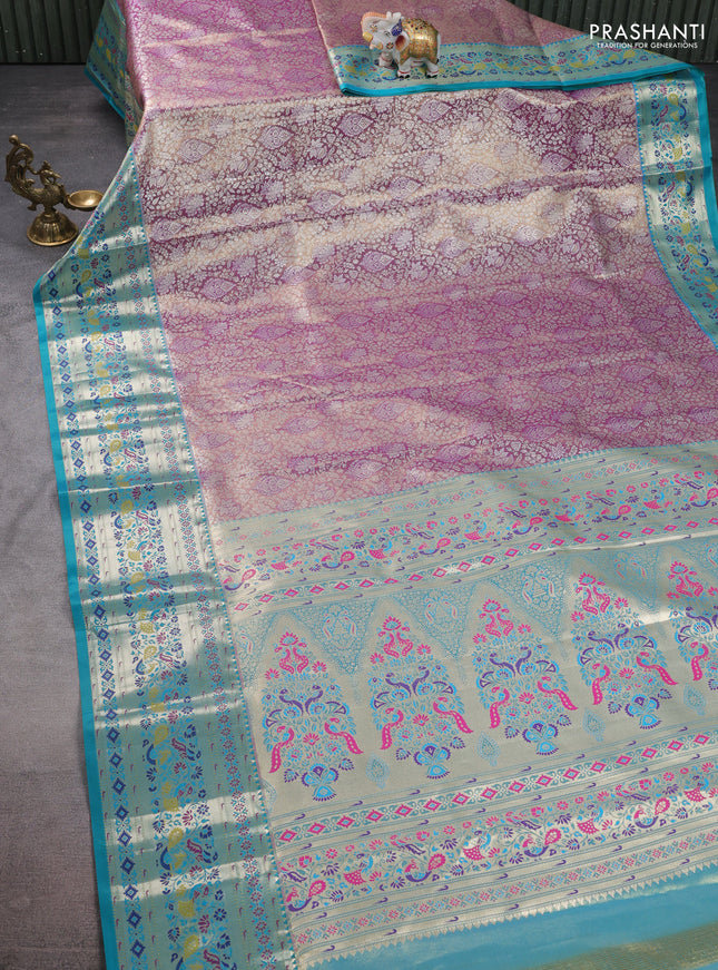 Tissue paithani silk saree dual shade of lavender and teal green with allover silver zari woven brocade weaves and zari woven paithani style border
