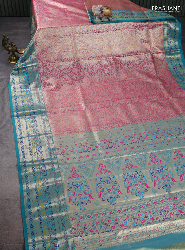 Tissue paithani silk saree dual shade of light pink and teal blue with allover silver zari woven brocade weaves and zari woven paithani style border