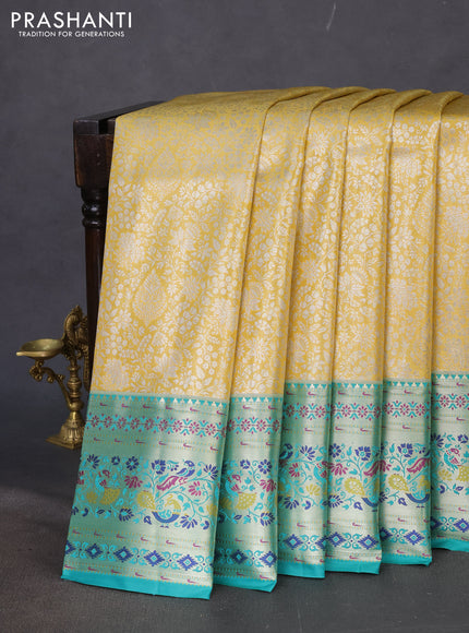 Tissue paithani silk saree yellow and teal green with allover zari woven brocade weaves and zari woven paithani style border