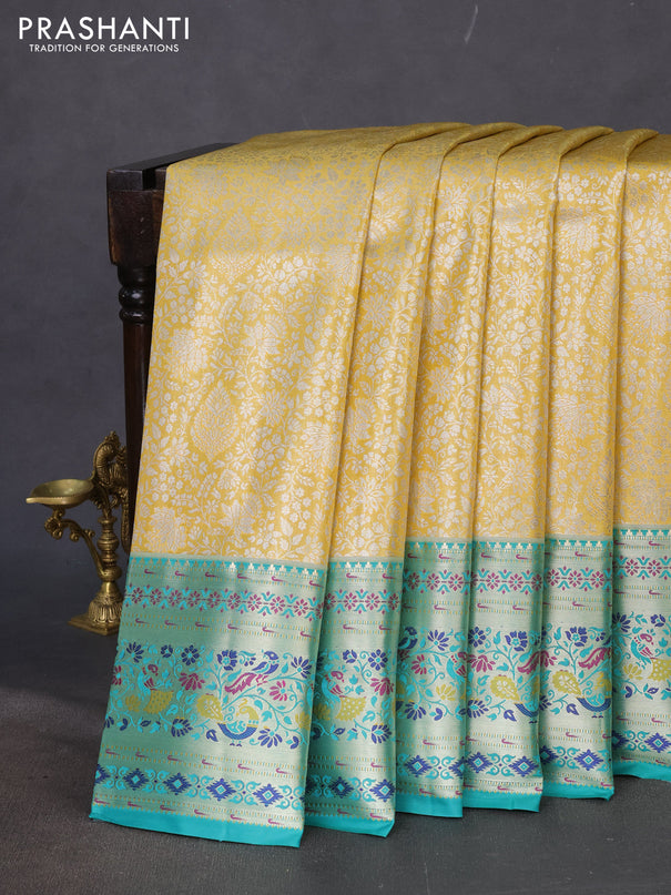 Tissue paithani silk saree yellow and teal green with allover zari woven brocade weaves and zari woven paithani style border