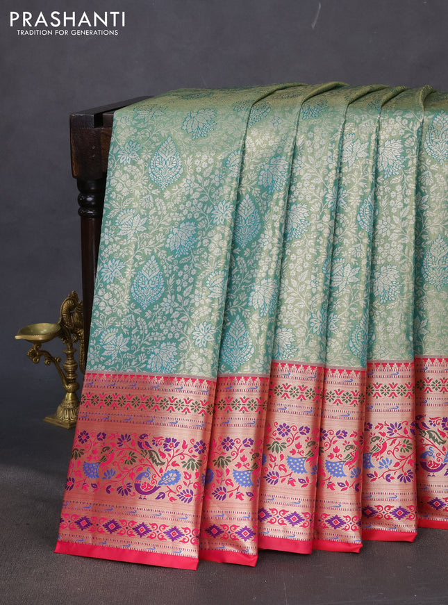 Tissue paithani silk saree teal green and reddish pink with allover zari woven brocade weaves and zari woven paithani style border