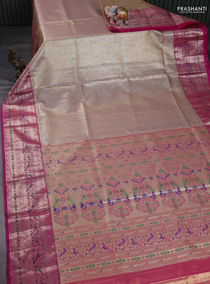 Tissue paithani silk saree dual shade of pastel peach and pink with allover silver zari woven brocade weaves and zari woven paithani style border