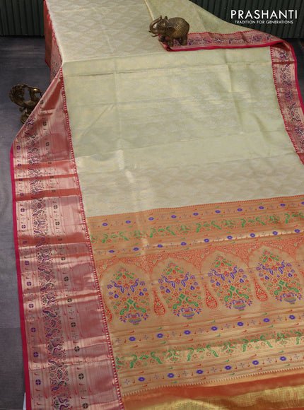 Tissue paithani silk saree cream and pink with allover zari woven brocade weaves and long zari woven paithani style border