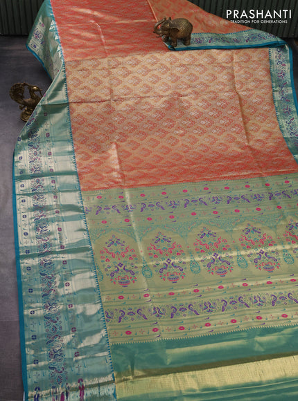 Tissue paithani silk saree dual shade of reddish gold and teal green with allover zari woven brocade weaves and long zari woven paithani style border
