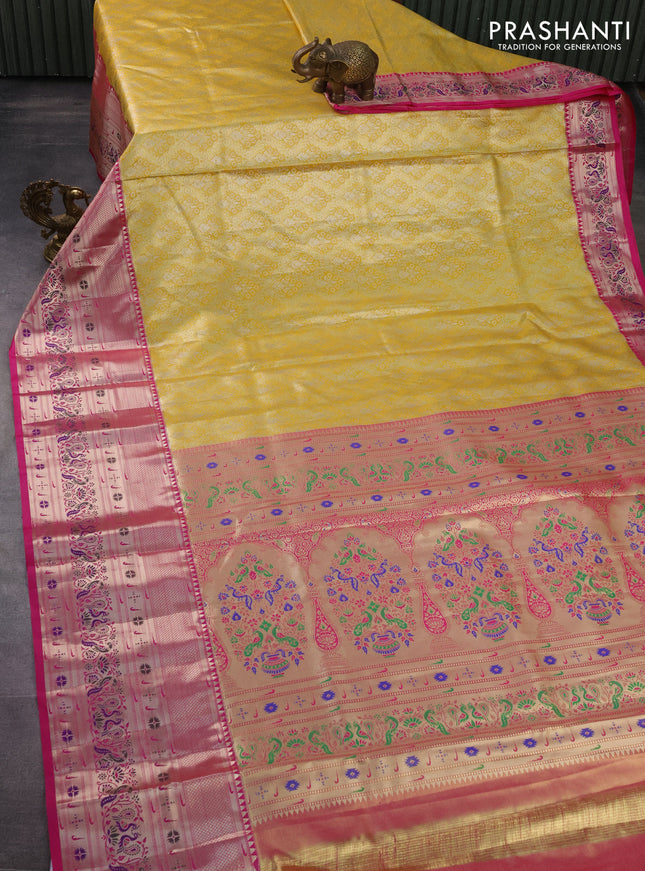 Tissue paithani silk saree yellow and pink with allover zari woven brocade weaves and long zari woven paithani style border