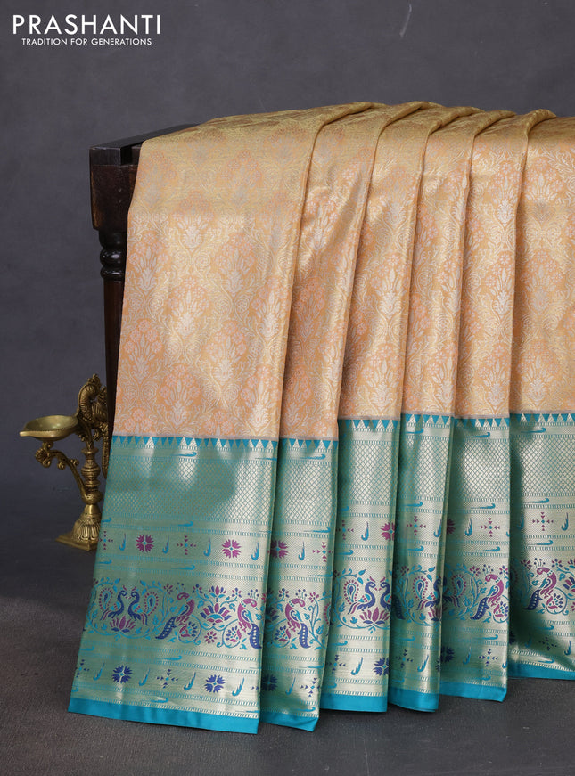 Tissue paithani silk saree sandal and teal green with allover zari woven brocade weaves and long zari woven paithani style border