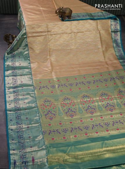 Tissue paithani silk saree sandal and teal green with allover zari woven brocade weaves and long zari woven paithani style border