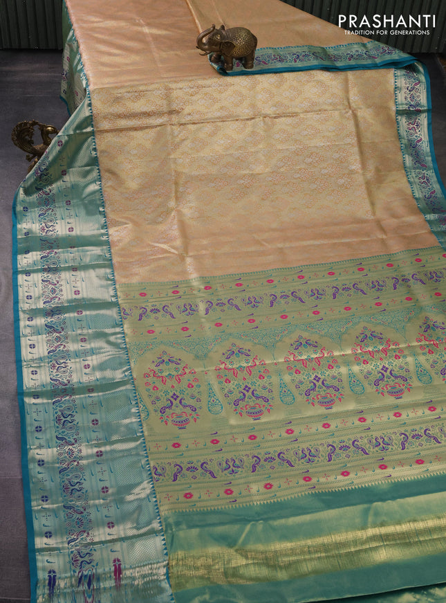 Tissue paithani silk saree sandal and teal green with allover zari woven brocade weaves and long zari woven paithani style border
