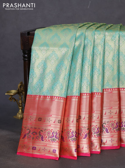 Tissue paithani silk saree teal shade and pink with allover zari woven brocade weaves and long zari woven paithani style border