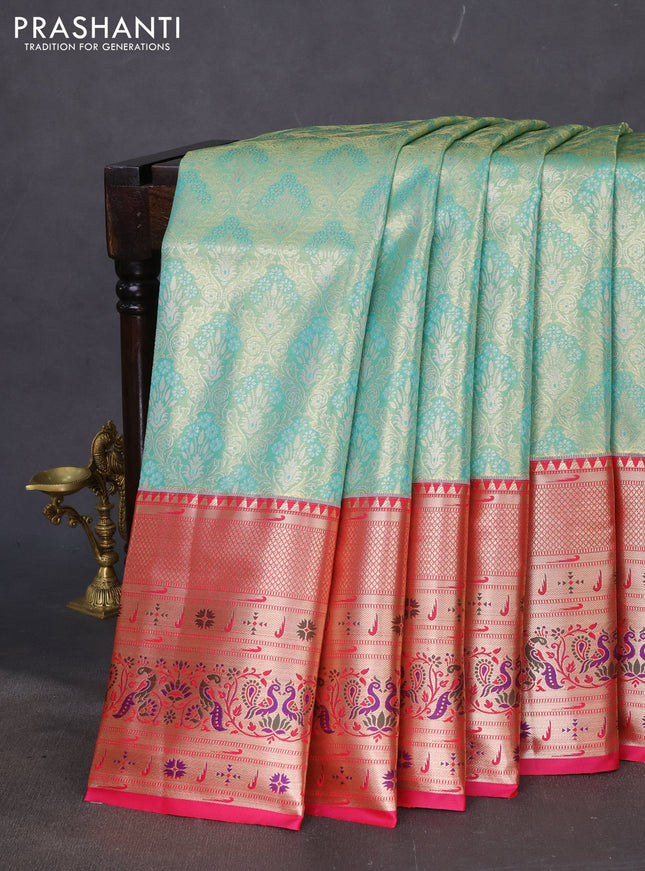 Tissue paithani silk saree teal shade and pink with allover zari woven brocade weaves and long zari woven paithani style border