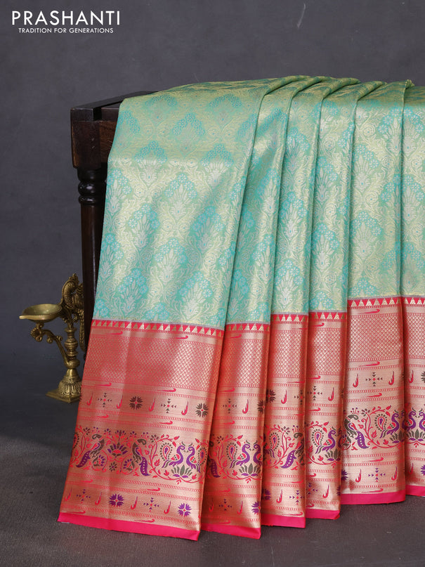 Tissue paithani silk saree teal shade and pink with allover zari woven brocade weaves and long zari woven paithani style border