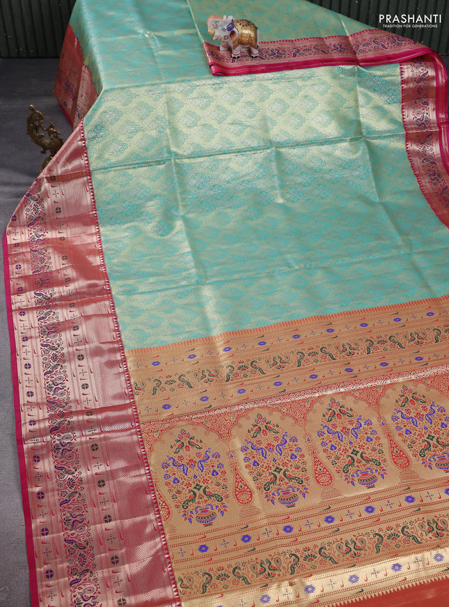 Tissue paithani silk saree teal shade and pink with allover zari woven brocade weaves and long zari woven paithani style border