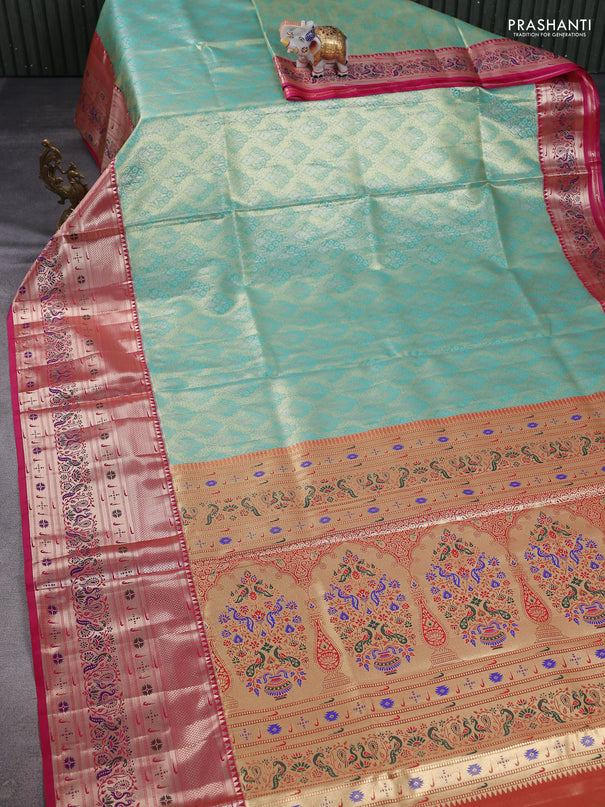 Tissue paithani silk saree teal shade and pink with allover zari woven brocade weaves and long zari woven paithani style border