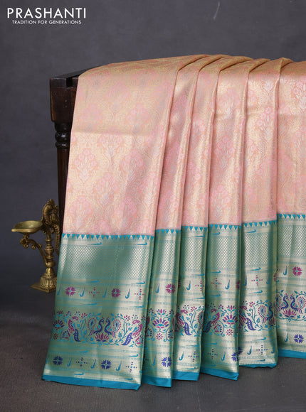Tissue paithani silk saree peach shade and teal green with allover silver zari woven brocade weaves and long zari woven paithani style border