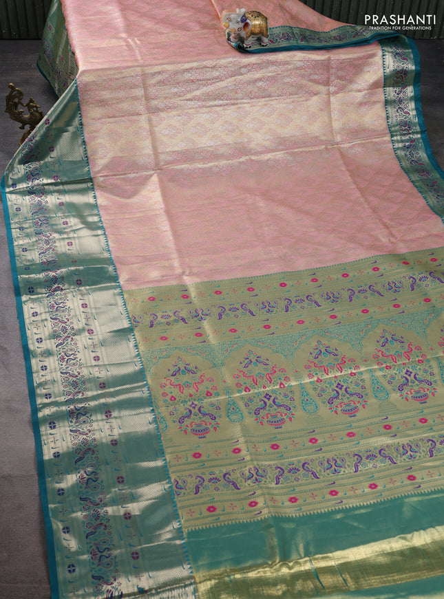 Tissue paithani silk saree peach shade and teal green with allover silver zari woven brocade weaves and long zari woven paithani style border