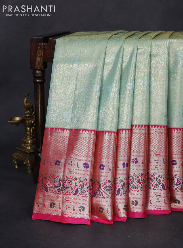 Tissue paithani silk saree pastel green and pink with allover silver zari woven brocade weaves and long zari woven paithani style border