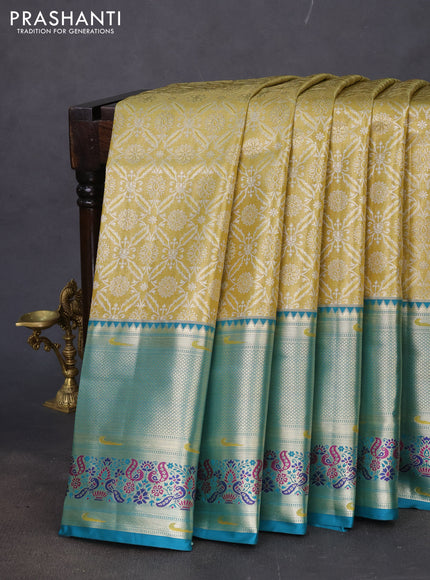Tissue paithani silk saree mustard yellow and teal green with allover silver zari woven brocade weaves and long zari woven paithani style border