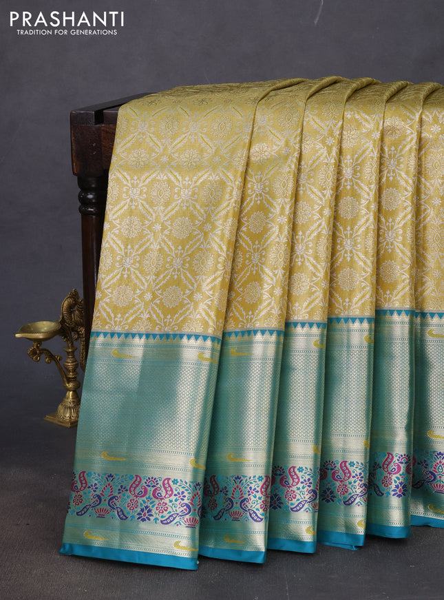 Tissue paithani silk saree mustard yellow and teal green with allover silver zari woven brocade weaves and long zari woven paithani style border